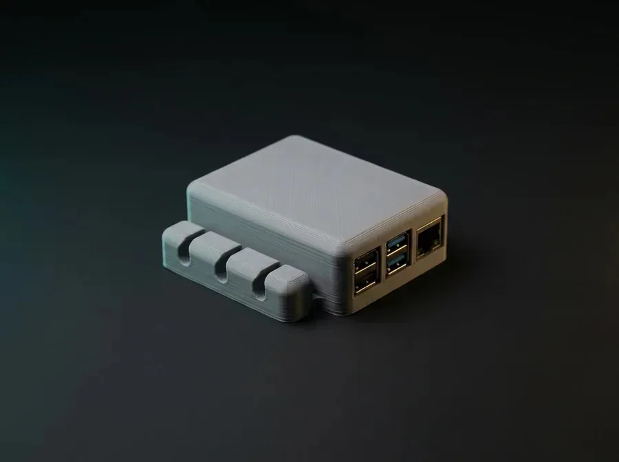 A clean matte 3D print — cable organizers and an enclosure