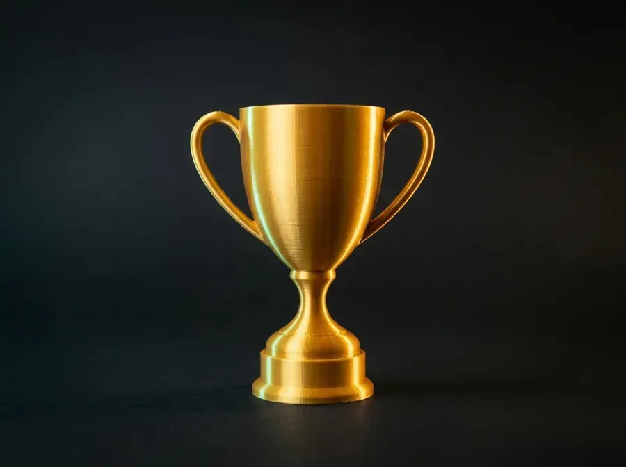 A shiny silk-PLA 3D print — a decorative trophy