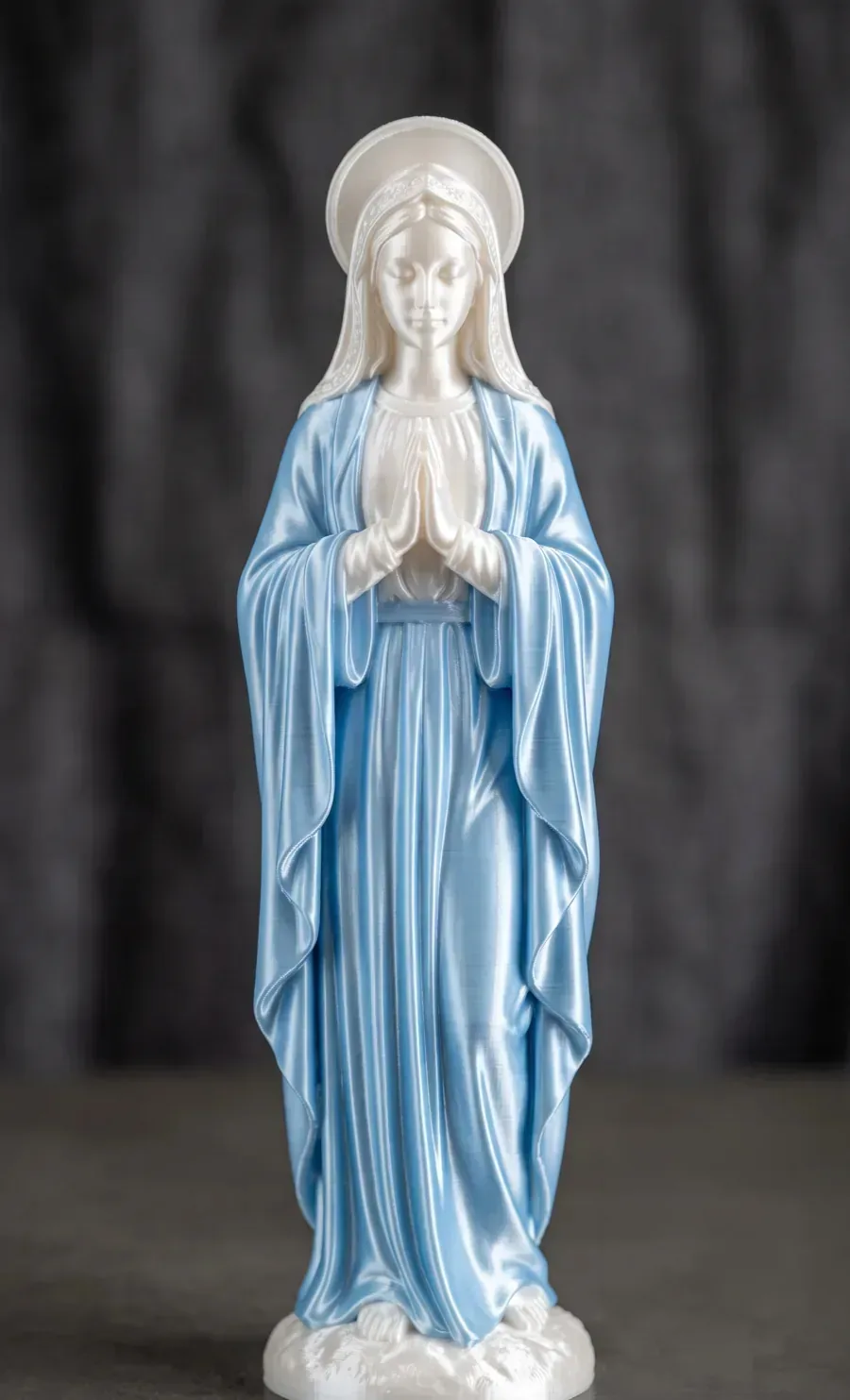 A 3D-printed statue of the Virgin Mary in silk white and blue PLA